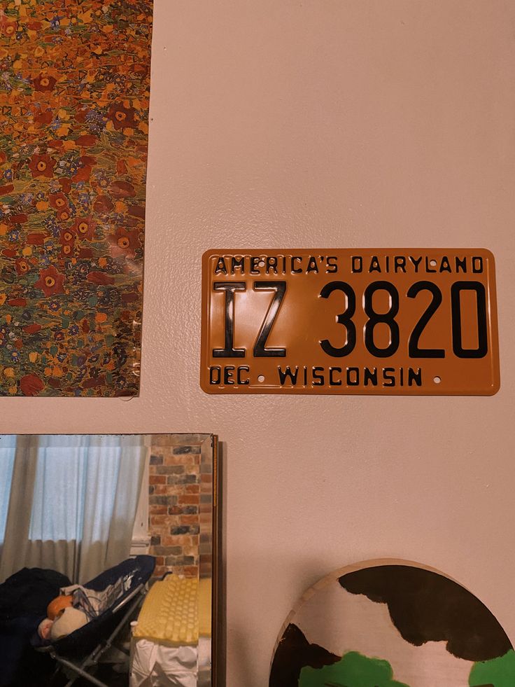 there is a license plate on the wall