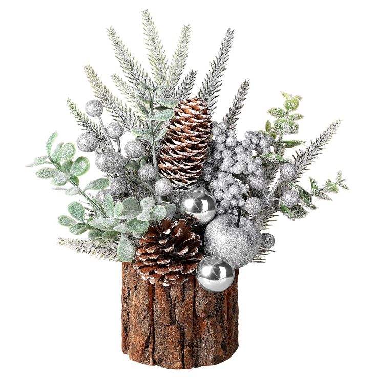 a pine cone filled with silver ornaments and greenery on top of a tree stump