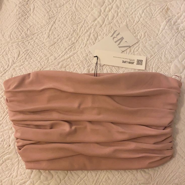 Dusty Rose Crop Top Strapless Has Boning To Stay Up Side Zipper Closure Very Cute Top. With Ruching This Is Such A Cute Top. However, I Lost A Ton Of Weight And It Didn't Fit. Brand New Still With Tags. Chic Pink Stretch Crop Top, Chic Stretch Pink Crop Top, Pink Ruched Sleeveless Crop Top, Pink Sleeveless Ruched Crop Top, Elegant Pink Tube Top, Sleeveless Ruched Pink Crop Top, Elegant Pink Sleeveless Tube Top, Pink Stretch Tube Top For Night Out, Pink Bandeau Top For Parties