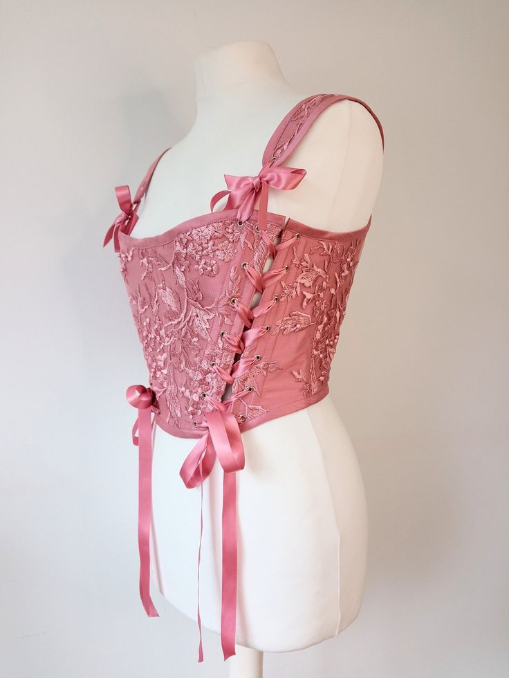 Beautiful mauve pink / vintage rose lace and silk handmade stays / corset! Free worldwide shipping and sent with a tracking number. This is a custom made design, please send me your bust and waist measurements. Crafted from mauve pink / vintage rose 100% silk covered in beautiful pink lace. The front panel is reversible and the other side is the plain mauve pink silk. Laced down two sides of the front panel which can be turned around. Mauve pink silk for bias binding and lovely pink satin ribbon Stays Corset, Corset Stays, Coquette Princess, Corset Outfit, Fairytale Fashion, Pink Corset, Vintage Corset, Satin Ribbons, Bias Binding