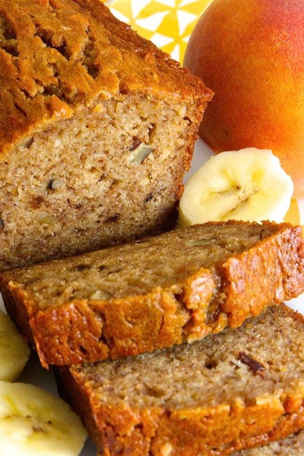 slices of banana bread on a plate next to sliced peaches