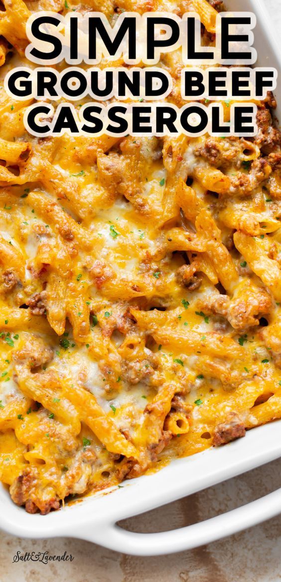 a casserole dish filled with ground beef and cheese in a white casserole dish