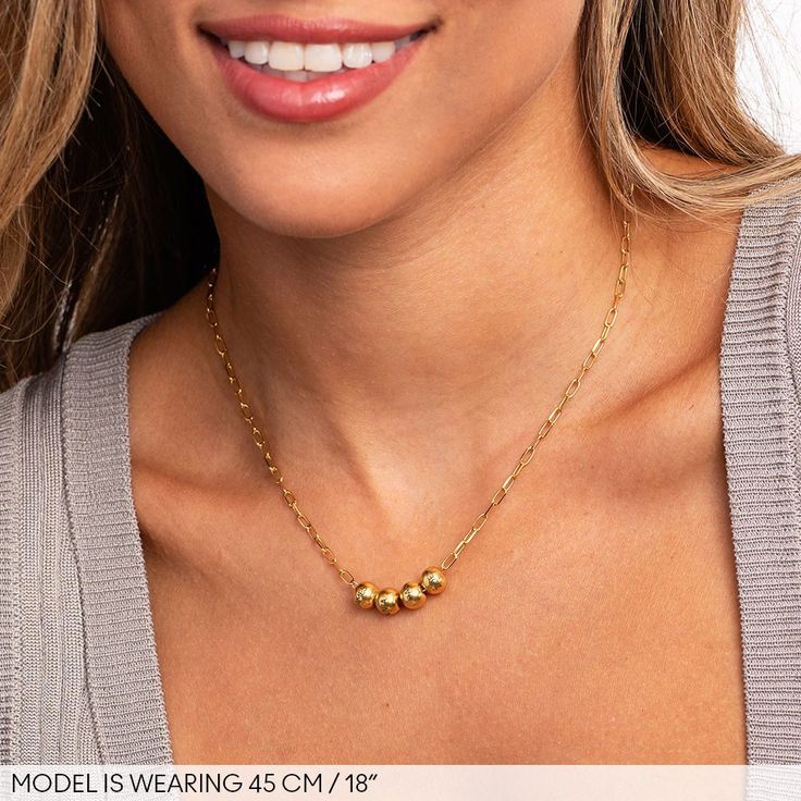 The Balance Necklace in 18K Gold Plating-3 Everyday Round Beads Charm Necklace, Elegant Gold Beaded Pendant Jewelry, Everyday Chain Necklace With Round Beads, Elegant Necklace With Satellite Chain For Anniversary, Elegant Necklaces With Satellite Chain For Anniversary, Elegant Satellite Chain Necklace For Anniversary, Delicate Chain Charm Necklaces With Round Beads, Chic Gold Necklace For Anniversary, Modern Gold Necklaces For Anniversary