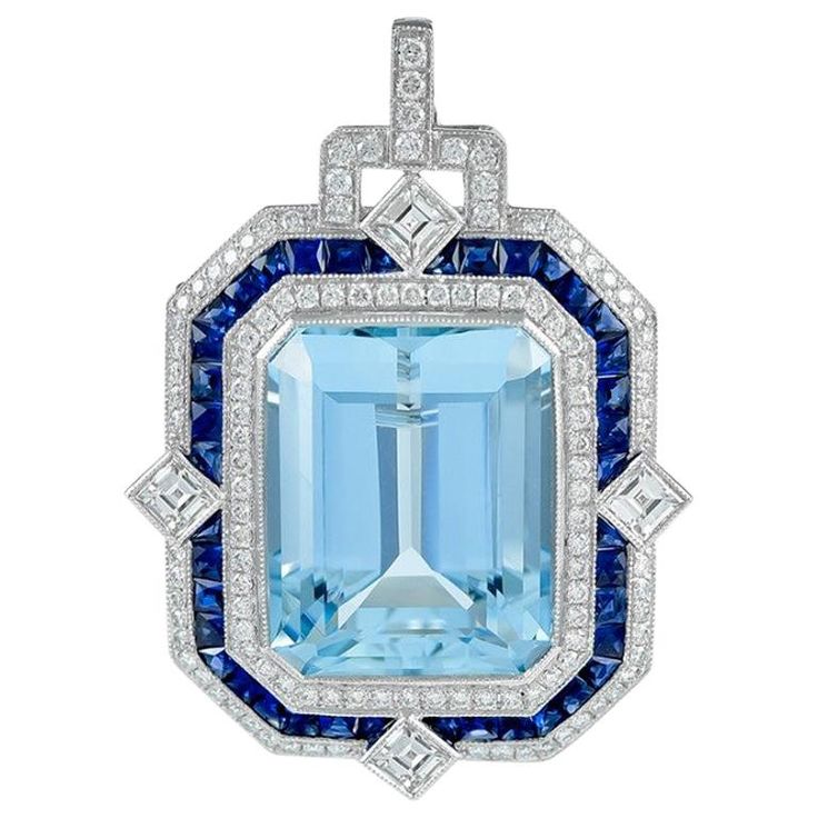 This pendant set in platinum is designed with precious aquamarine stone in the center with the total carat weight of 24.38 surrounded with stunning sapphire stone with the carat weight of 3.77, together with beautiful brilliant diamonds with the total carat weight of 3.68. Sophia D by Joseph Dardashti LTD has been known worldwide for 35 years and are inspired by classic Art Deco design that merges with modern manufacturing techniques. Chinese Pendant, Platinum Pendant, Drop Necklaces, Expensive Jewelry Luxury, Gemstone Art, Aquamarine Pendant, Art Deco Pendant, Art Deco Necklace, Expensive Jewelry