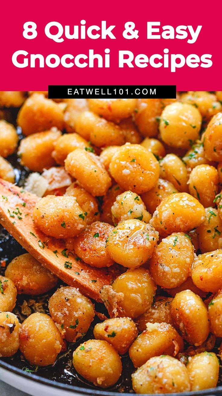 a wooden spoon is being used to stir up some chickpeas in a skillet