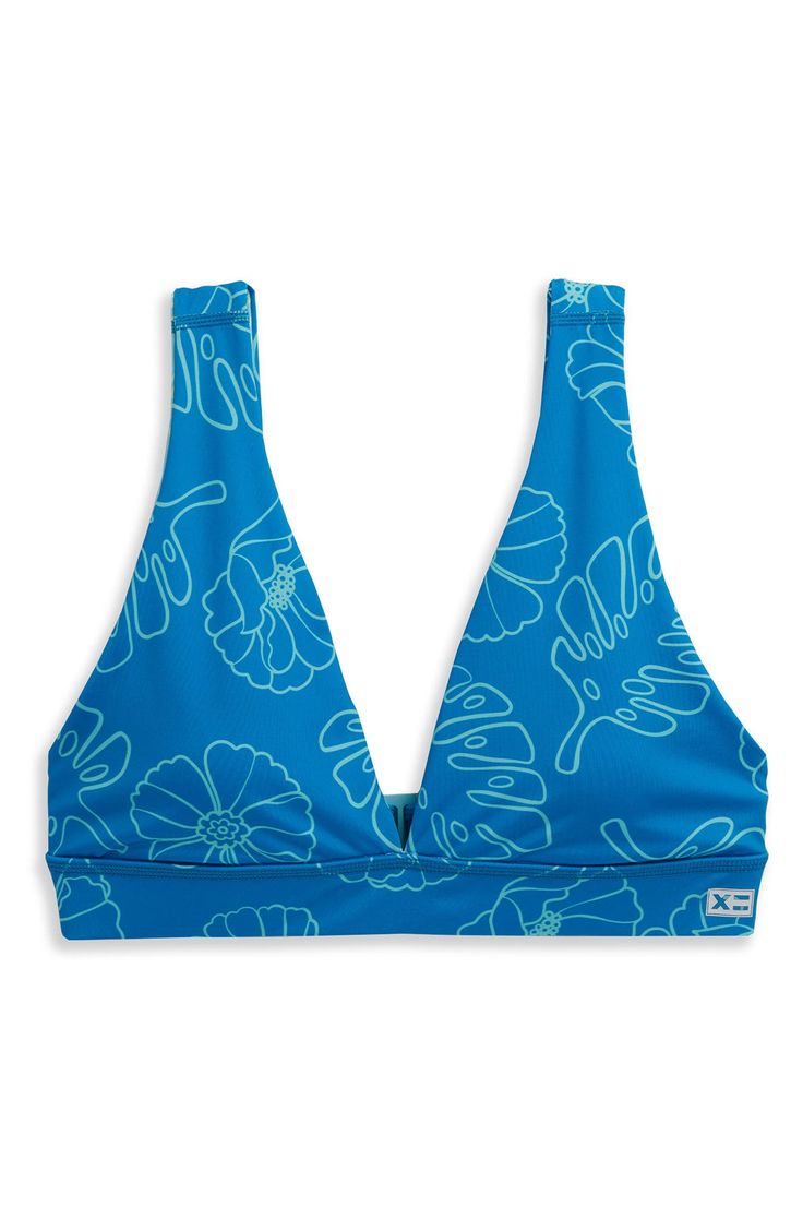 Switch your beach look from colorful to classic and back in this top made with wide straps and full-coverage cups for comfortable support in a plunging style. Clasps at back UPF 50 sun protection Reversible Lined 80% recycled polyester, 20% spandex Machine wash, tumble dry Imported V-neck Halter Top With Built-in Bra For Vacation, Summer Swimwear With Adjustable Straps And Low-cut, Low-cut Swimwear With Adjustable Straps For Vacation, V-neck Swimwear With Adjustable Straps, Summer Low-cut Swimwear With Adjustable Straps, Padded V-neck Swimwear For The Beach, Low-cut Halter Top For Beach In Spring, Spring Low-cut Halter Top For Beach, Summer Low-cut Swimwear With Built-in Bra