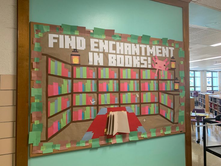 a bulletin board with books on it in an office building that reads find enchantment in books