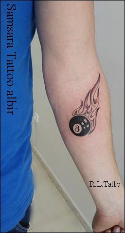 a person with a tattoo on their arm