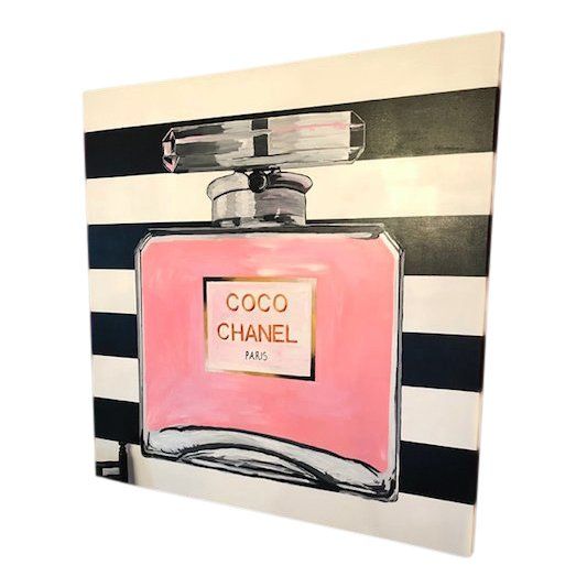 a painting of a chanel bottle on a black and white striped background with the word coco