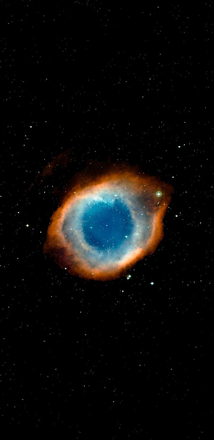 an eyeball in the sky with stars around it and blue light coming from its center