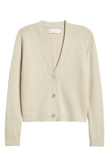 This V-neck cardigan is cut from a cozy wool blend that wraps you up in warm comfort and offers a clean, classic look. Front button closure V-neck Long sleeves Ribbed cuffs and hem 55% merino wool, 25% nylon, 20% cotton Dry clean Imported Neutral V-neck Cardigan For Work, Classic V-neck Soft Knit Outerwear, Everyday Cream V-neck Outerwear, Everyday Beige V-neck Outerwear, Cream V-neck Sweater For Workwear In Fall, Beige Cashmere V-neck Outerwear, Classic Beige Wool V-neck Sweater, Fall Beige Wool V-neck Sweater, Classic Neutral Cardigan For Layering