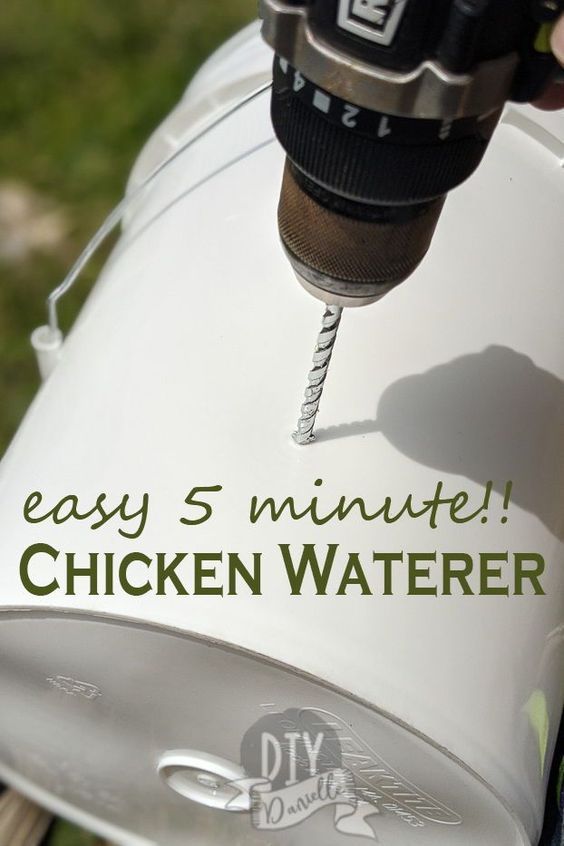 a person using a drill to fix a chicken waterer