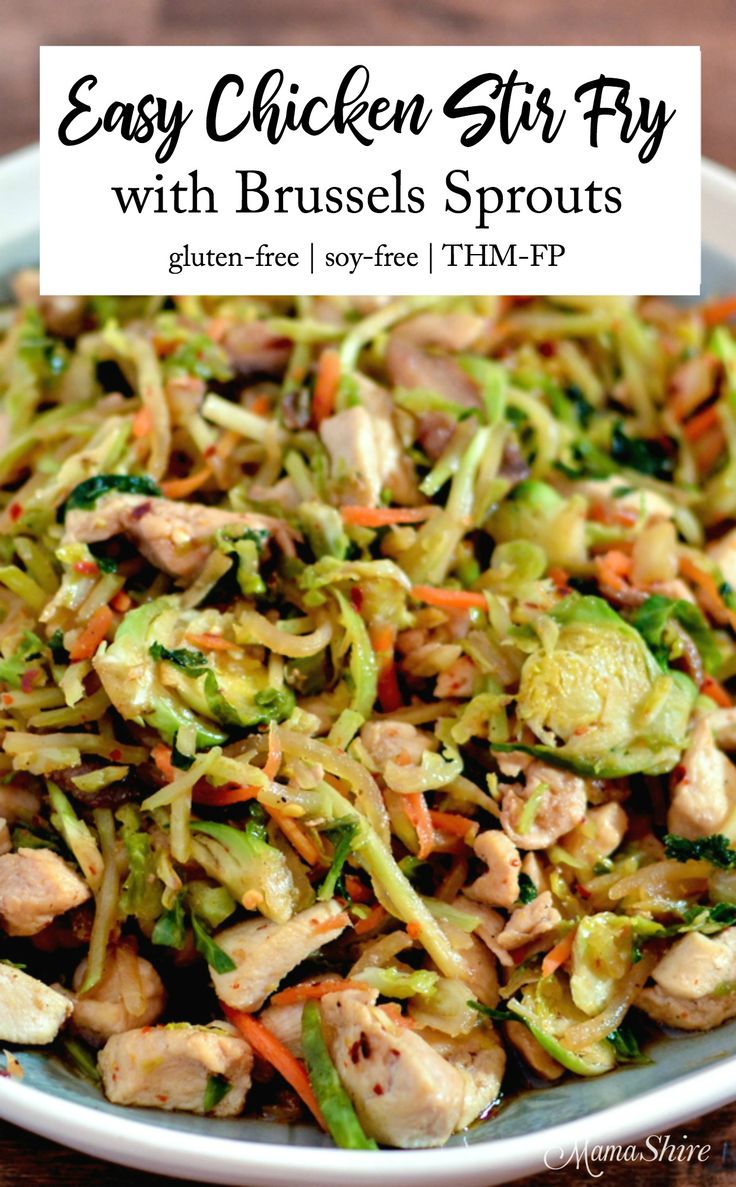 an easy chicken stir fry with brussel sprouts in a white bowl