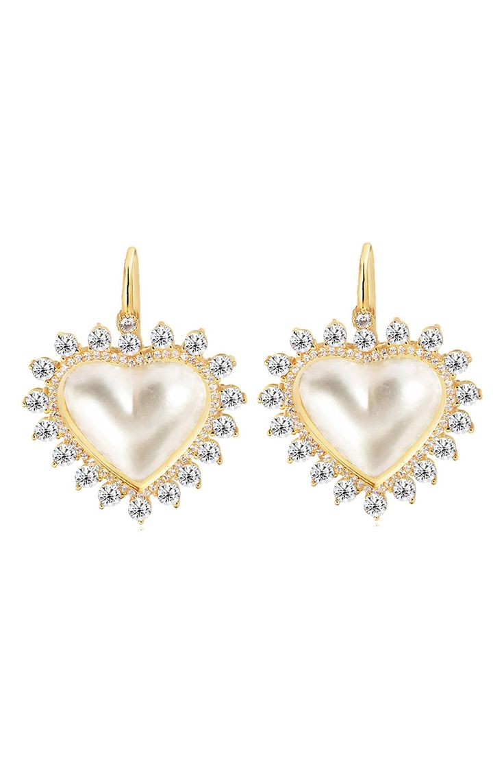 Polished 14-karat gold-plated sterling silver earrings suspend romantic mother-of-pearl heart drops framed in sparkling cubic zirconia halos. 3/4" drop; 5/8" width French wire Sterling silver/14k-gold plate/mother-of-pearl/cubic zirconia Made in Turkey Heart Shaped Pearl Earrings As Gift, Elegant Cubic Zirconia Earrings For Mother's Day, Heart-shaped Pearl Earrings For Formal Occasions, Elegant Silver Heart Earrings, Gold Plated, Elegant Gold Plated Heart Earrings As Gift, Elegant Round Heart Earrings For Mother's Day, Elegant Heart Earrings For Mother's Day, Gold Plated Silver Heart Earrings For Anniversary, Elegant Heart Earrings For Anniversary On Mother's Day