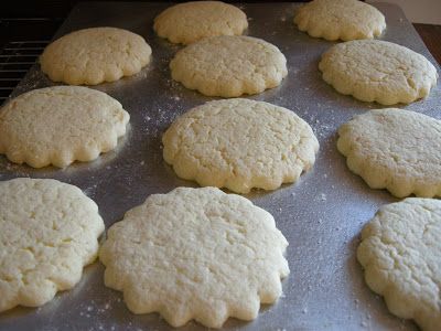 a bunch of cookies sitting on top of a cookie sheet