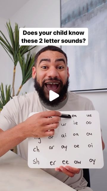 a man holding up a sign that says does your child know these 2 letter sounds?