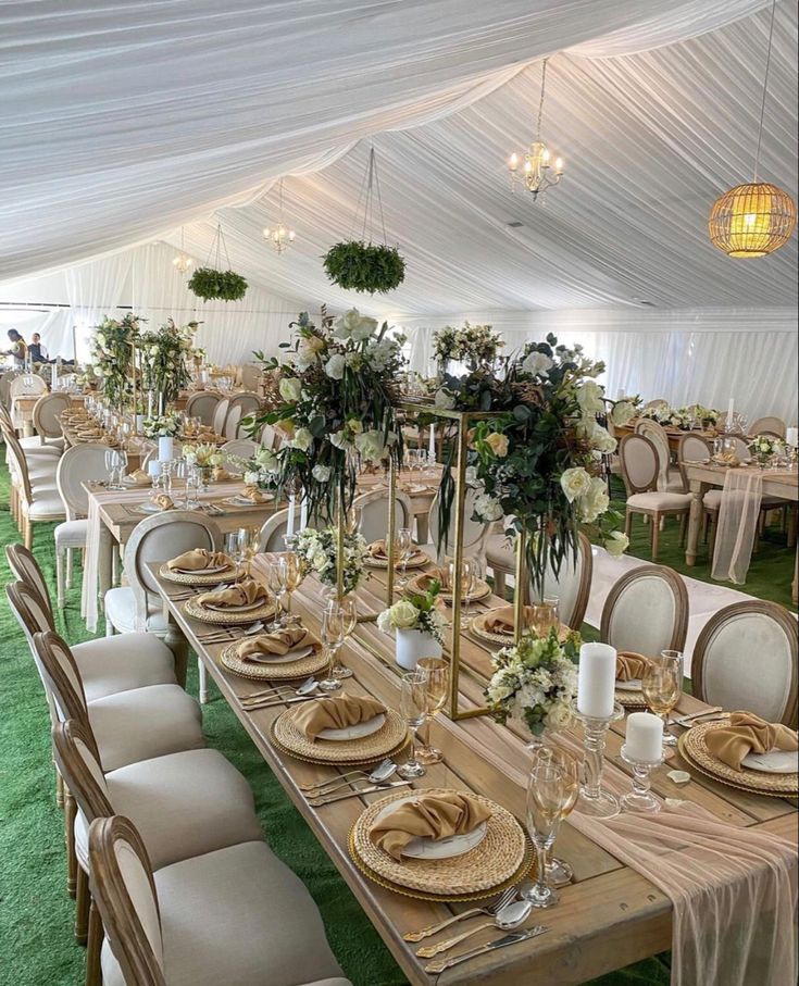 the tables are set with place settings for formal dinner guests to sit down and eat