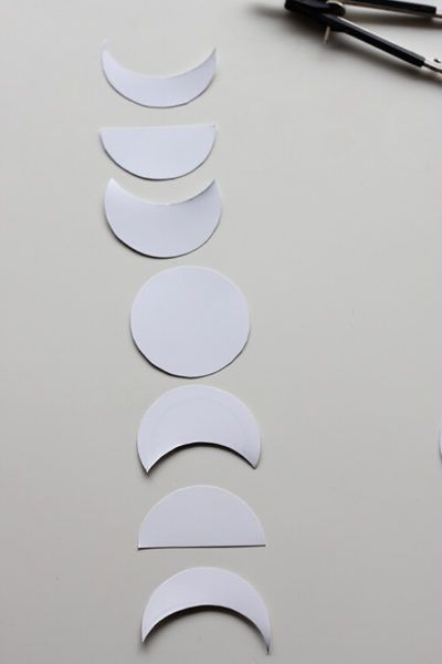 the paper circles are cut out and ready to be painted