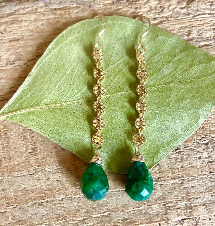 Gold filled dangle earrings with faceted emerald gemstones Yellow Gold Emerald Dangle Jewelry, Elegant Emerald Gemstone Earrings, Green Gemstone Dangle Earrings, Green Gemstone Dangle Chandelier Earrings, Green 14k Gold-filled Dangle Earrings, Emerald Gemstone, Tourmaline Gemstone, Cool Necklaces, Garnet Gemstone