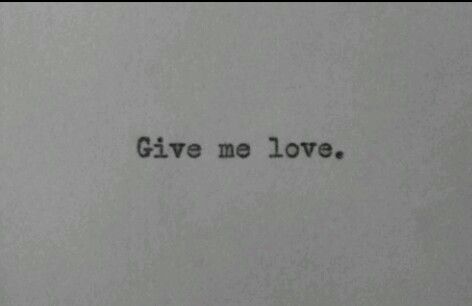 the words give me love written in black ink