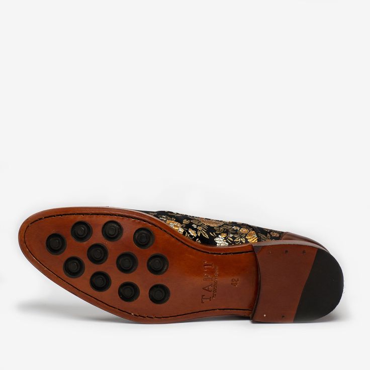 One of our most popular styles, our signature Jack Shoe gets a daring makeover in this bold floral print shoe with a richly-hued brown leather cap toe. Luxury Slip-on Dress Shoes With Textured Sole, Luxury Slip-ons With Leather Sole And Plain Toe, Wingtip Slip-ons With Removable Insole, Luxury Slip-ons With Leather Sole, Modern Wingtip Lace-up Shoes With Rubber Sole, Plain Toe Slip-ons With Leather Sole For Galas, Patent Leather Loafers With Rubber Sole And Almond Toe, Formal Slip-ons With Contrast Sole And Almond Toe, Formal Almond Toe Slip-ons With Contrast Sole