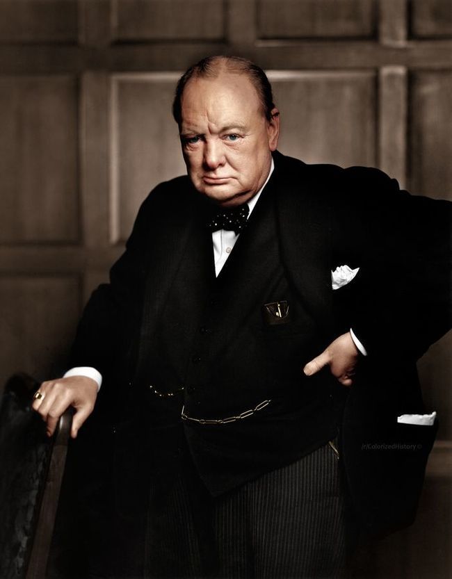 black and white photograph of a man in a tuxedo