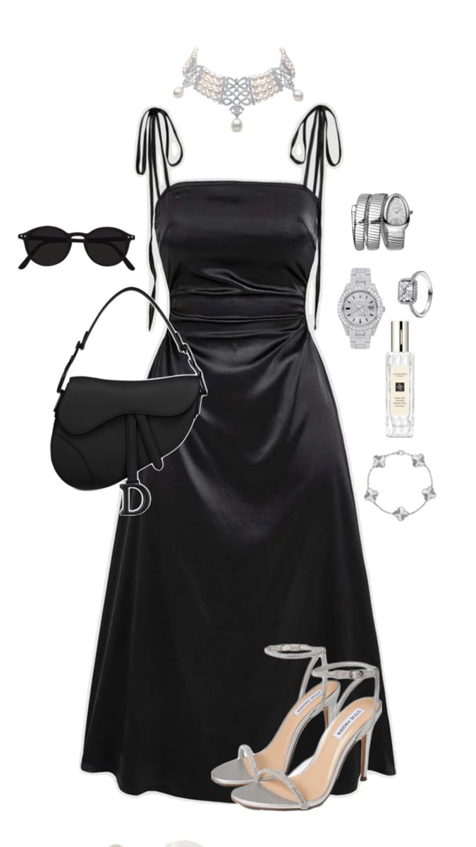 a woman in black dress and shoes with accessories