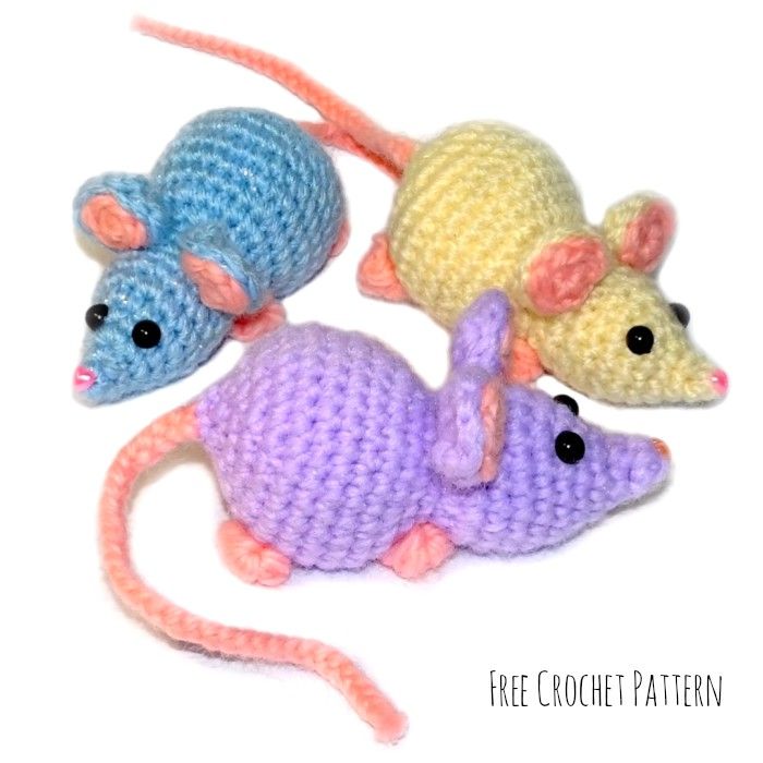 three crocheted mice sitting next to each other