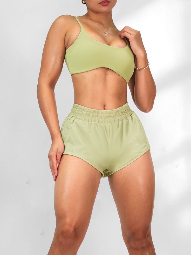 Velocity Sports Bra (Sage) Green Stretch Cropped Sports Bra, Green Stretch Seamless Sports Bra, Green Seamless Stretch Sports Bra, Green Seamless Elastane Sports Bra, Green Cropped Seamless Sports Bra, Stylish Shorts, Stay Active, Running Shorts, Sports Bras