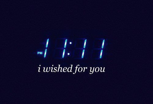 an alarm clock with the words i wished for you written in white on a dark background