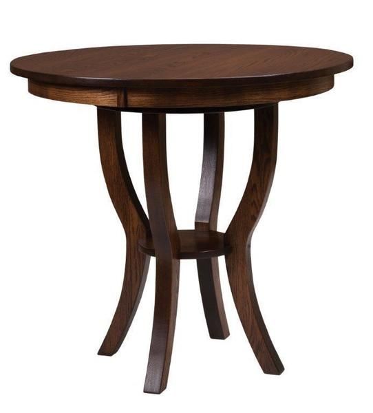 a round wooden table with curved legs