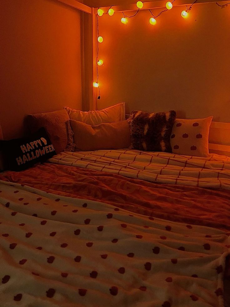 a bed that has some lights on it