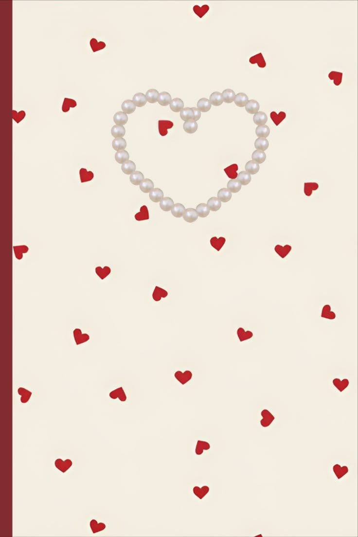 a card with hearts and pearls in the shape of a heart