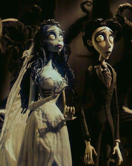 the corpse bride and groom are standing next to each other in black and white photo