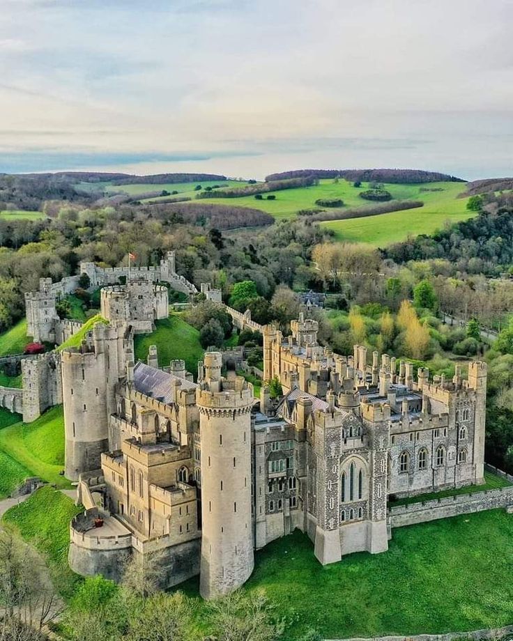 an aerial view of a castle in the countryside