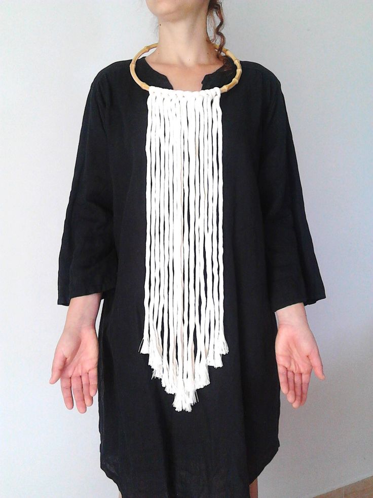 Fringes length : 23 inches. Choker diameter : 8 inches. Color : Off white. Availabe in yellow. Long tribal boho necklace with off white cotton fringes in wood choker. There is no closure. Just put it over the head. It's very soft and lightweight. A realy statement piece. Composition: I always use natural materials, in this case cotton cords. The materials I use, are made from a small local traditional company. They use natural products such as cotton, silk and viscose and they love colors. The m White Macrame Necklace For Festival, White Macrame Necklace For Festivals, Bohemian Fringe Necklace, White Tassel Jewelry For Festival, Festival White Jewelry With Tassels, Festival White Tassel Jewelry, Bohemian White Necklaces For Festival, Handmade White Bohemian Necklaces, Bohemian White Necklace For Festival