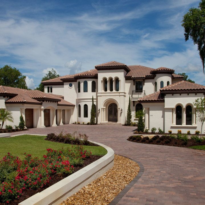 a large white house with lots of windows