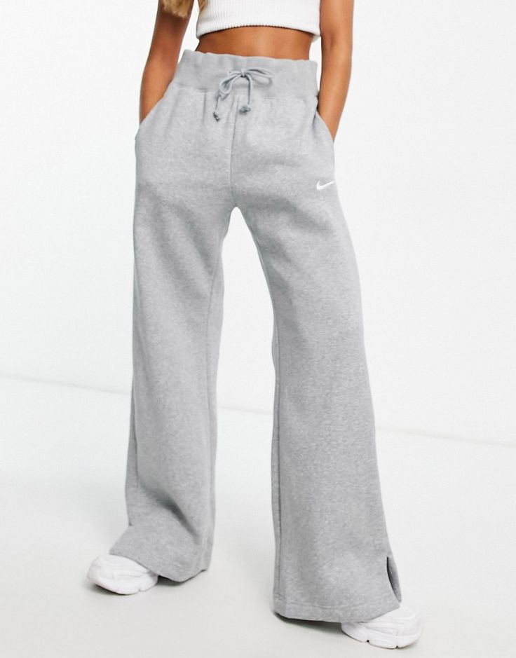 Joggers by Nike Can't go wrong in sweats Elasticated drawstring waist Side pockets Logo embroidery Wide leg Wide Joggers, Wide Sweatpants, Nike Phoenix Fleece, Grey Nike Sweatpants, Nike Sweats, Wide Leg Sweatpants, Sweat Pants, Fantasy Clothing, Pajama Sets