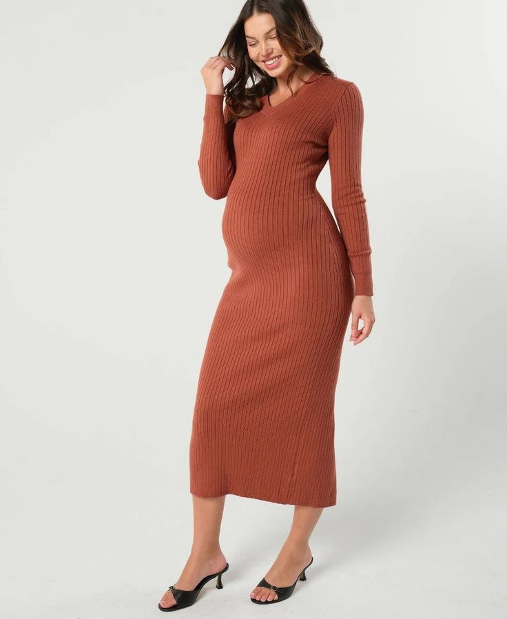 This isn't your mom's maternity dress. The Full Body Maternity & Nursing Sweater Dress will wrap you in supportive, luxurious knit, making you feel chic, feminine, and cozy all at once.he flattering v-neck and maxi length elongate and slim, while showing off your best baby assets proudly! Look party or office ready, while feeling like you're in your coziest robe all day long. Best of all, this dress keeps looking amazing long after you're done with pregnancy life. Orange Maternity Dress, Long Maternity Dress, Maternity Work Wear, Nursing Sweater, Maternity Sweater Dress, Maternity Long Dress, Petite Models, Maternity Outfit, Sweater Maxi Dress