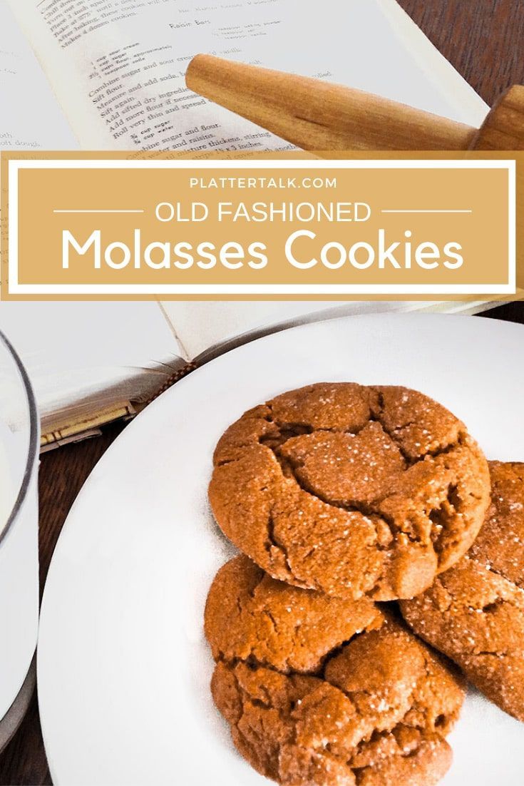 old fashioned molasses cookies on a white plate with an open book in the background