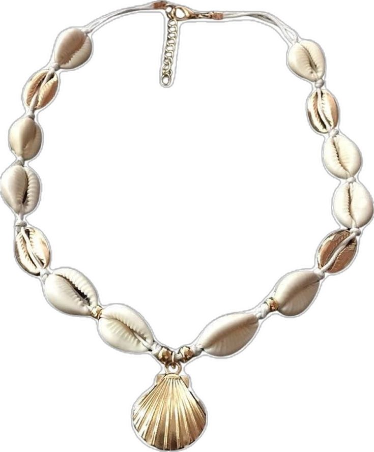 Vintage Cowrie Shell Necklace: Unlock the Maritime Elegance Step into a world of nautical sophistication with our Vintage Cowrie Shell Necklace. This exquisite piece of jewelry pays homage to the majestic beauty of the sea and its captivating symbols. Crafted for passionate lovers of the ocean, especially women, this necklace is an exquisite addition to our Shell Necklace Collection. Features of Vintage Cowrie Shell Necklace based on Product Content Authentic Cowrie Shell: Each necklace features Elegant Silver Necklace For Beach, Elegant Metal Jewelry For Beach, Gold Alloy Jewelry For Beach, Elegant Jewelry With Oyster Bracelet, Gold Alloy Beach Jewelry, Elegant Beach Jewelry Made Of Alloy, Adjustable Metal Necklace For Beach, Elegant Silver Strand Jewelry, Elegant Shell Jewelry With Lobster Clasp