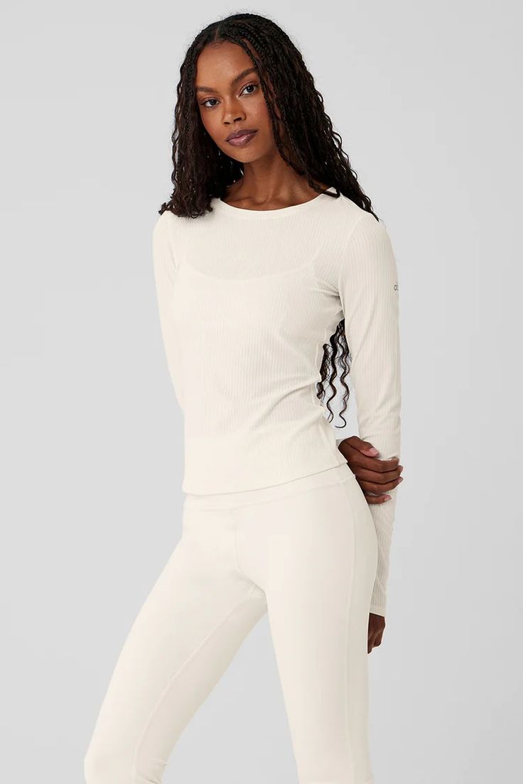 Ribbed Sea Coast Long Sleeve - Ivory | Alo Yoga Chic Alo Yoga Tops For Spring, Alo Yoga Long Sleeve Top, Casual Ribbed Alo Yoga Tops, White Stretch Alo Yoga Top, White Long Sleeve Alo Yoga Top, Alo Yoga White Long Sleeve Tops, Alo Yoga White Stretch Top, Spring Fitted Alo Yoga Tops, Fall Layering Tops By Alo Yoga