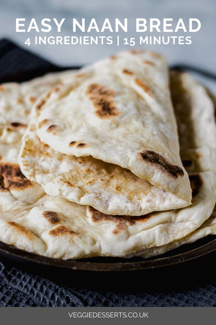 some tortillas are stacked on top of each other in a black plate, ready to be eaten