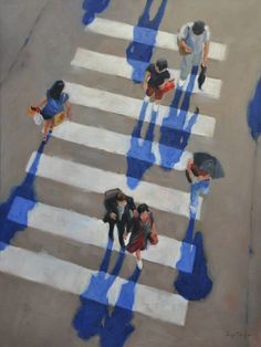 an aerial view of people crossing the street