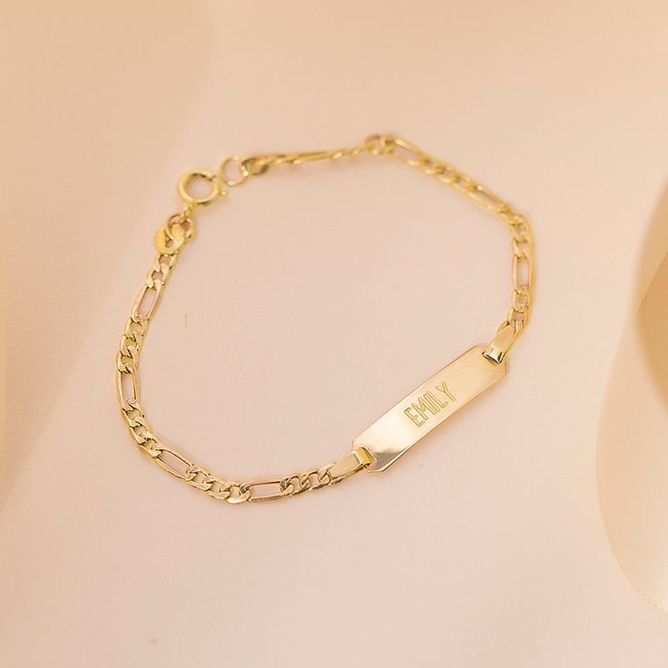 If you're looking for a creative and special gift for toddlers and children, this beautiful, engravable plain rectangular identification tag bracelet is a meaningful gift for any event. Entirely crafted in 14k Yellow Gold, which is safe for babies and children's everyday wear. Order a traditional ID bracelet today and we'll neatly package it into its own lovely gift box. Custom Name Rectangular Jewelry For Birthday, Custom Name Rectangular Jewelry For Birthday Gift, Personalized 14k Gold Hypoallergenic Bracelets, Classic Hypoallergenic Bracelets As Personalized Gift, Classic Hypoallergenic Bracelets For Personalized Gifts, Customizable Yellow Gold Bracelet For Personalized Gift, Classic 14k Gold Hypoallergenic Name Bracelet, Classic Hypoallergenic 14k Gold Name Bracelet, Classic Hypoallergenic Name Bracelet For Everyday