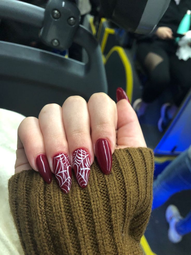 Dark Red Nails With Spider Web, Subtle Spiderman Nails, Red Nails With Spiderweb, Red Spider Web Nails, Spiderpunk Nails, Red Spiderweb Nails, Red Spider Nails, Spider Gwen Nails, Red Acrylic Nails Almond