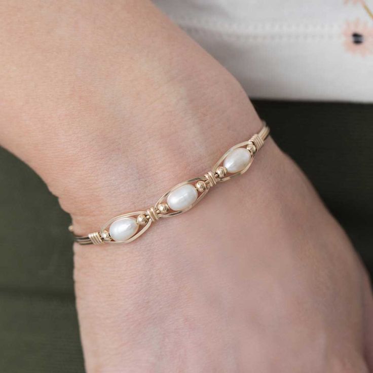 Bella is Italian for beautiful. This bracelet is made for that beautiful person in your life. Elegant Bangle Bracelets For Friendship, Elegant Gold Bead Bangle Bracelets, Elegant Bangle Bracelet For Friendship, Elegant Beaded Gold Bangle Bracelet, Elegant Gold Beaded Bangle Bracelet, Elegant Gold Hand Wrapped Stretch Bracelet, Elegant Stretch Bracelet With 14k Gold-filled Gold Beads, Elegant 14k Gold-filled Stretch Bracelet With Gold Beads, Elegant Adjustable Cuff Bracelet For Friendship