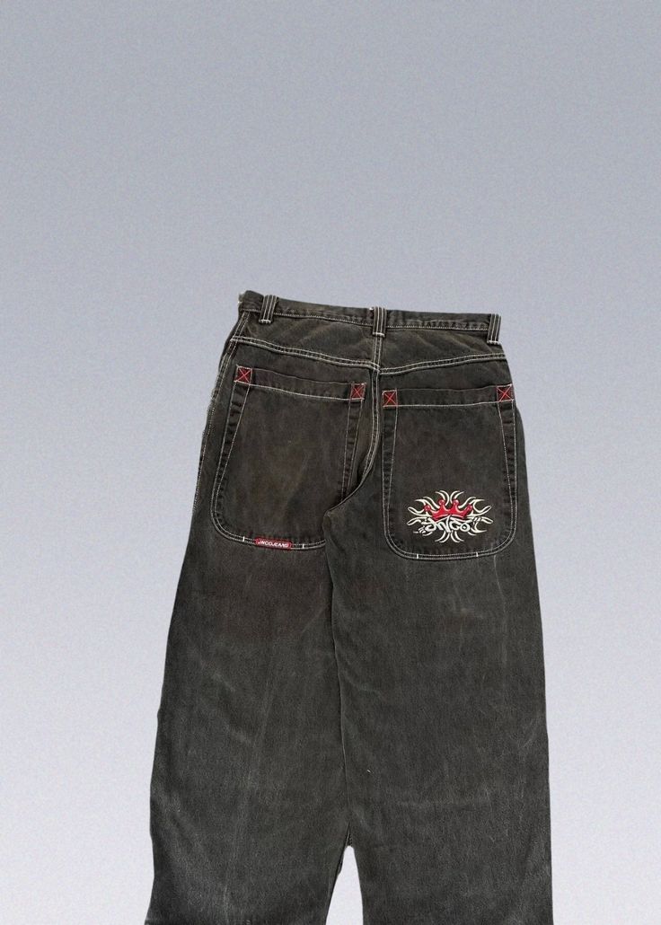 Vintage JNCO Jeans Y2K These Jnco Y2K Jeans feature a classic design that captures the essence of the 2000s fashion scene. With their wide leg, relaxed fit, and distinctive stitching, these jeans are a statement piece that will set you apart from the crowd. The attention to detail in the design ensures an authentic and unique look. - Details: 100% Cotton Super high quality and details Delivery within 2 weeks ☞ View MoreBranded Streetwear 90s Black Wide Leg Cargo Jeans, Y2k Straight Leg Cotton Jeans, Black Wide Leg Y2k Jeans, Black Y2k Wide Leg Jeans, Y2k Washed Black Cotton Bottoms, Washed Black Y2k Cotton Bottoms, Black Y2k Style Bottoms With Five Pockets, 90s Style Washed Black Jeans For Streetwear, 90s Washed Black Jeans For Streetwear