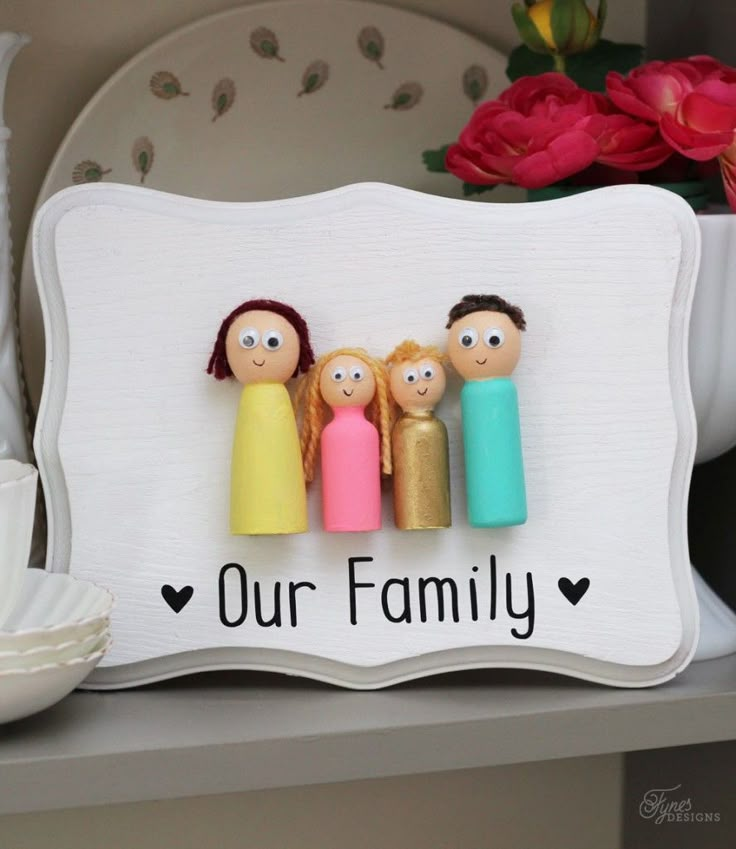 a family sign sitting on top of a table