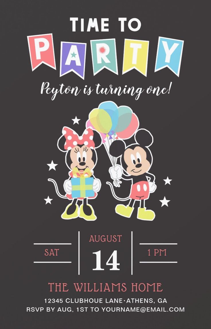 a mickey and minnie birthday party with balloons